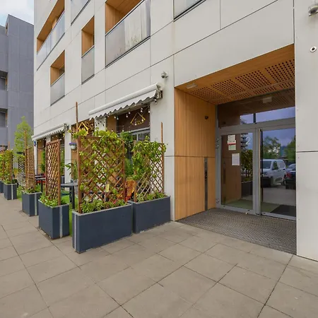 With Balcony In The Wola District Of By Renters Apartment Warsaw